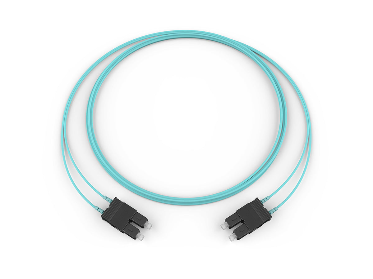 Corning 575702T5180005M | Fiber Optic Jumper, 2 F, SC Duplex to SC Duplex, Zipcord Cable, Riser, 2.9 mm legs Standard SC Duplex MM / Standard SC Duplex MM, OM3 50um, 2F, Zipcord Riser, Standard Aqua Jacket 5 Meters