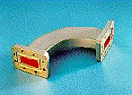 Commscope H112MH102L102SG | 90° H Plane Swept Bend for WR112, 7.05–10.0 GHz, with interface types PDR84 and UDR84, 102 mm x 102 mm, gray