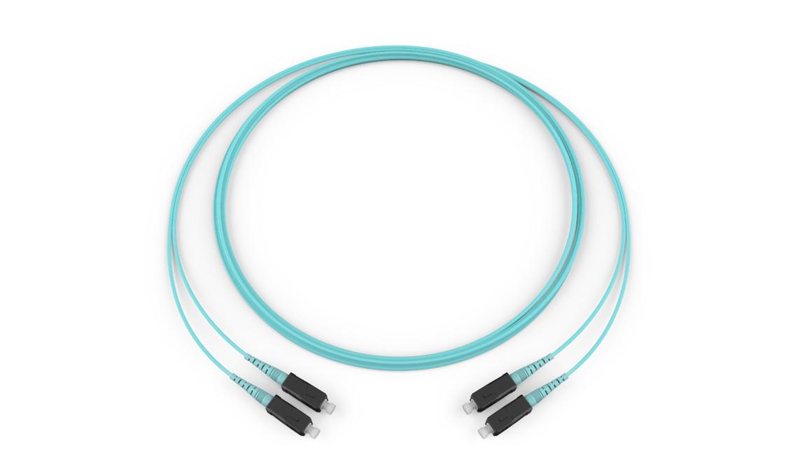 Corning 393902T5180003M | Standard SC Simplex MM / Standard SC Simplex MM, OM3 50um, 2F, Zipcord Riser, Standard Aqua Jacket 3 Meters