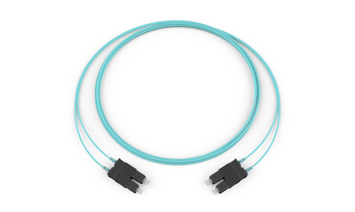 Corning 575702T5820001M | Standard SC Duplex MM / Standard SC Duplex MM, OM3 50um, 2F, Zipcord Plenum, Standard Aqua Jacket 1 Meters