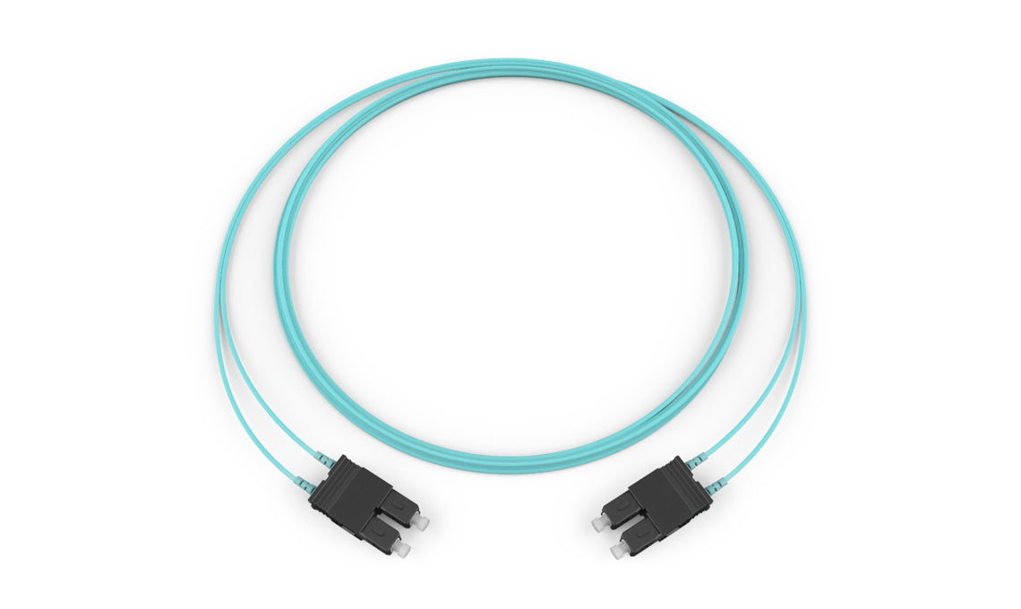 Corning 575702T5820002M | Standard SC Duplex MM/Standard SC Duplex MM, OM3 50um, 2F, Zipcord Plenum, Standard Aqua Jacket 2 Meters